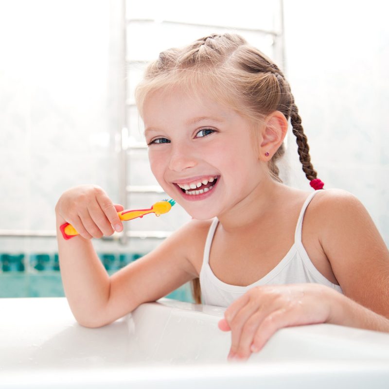 Little girl brushing teeth